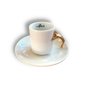taza de café con plato con asa bñada en oro inspirada en Gaudí